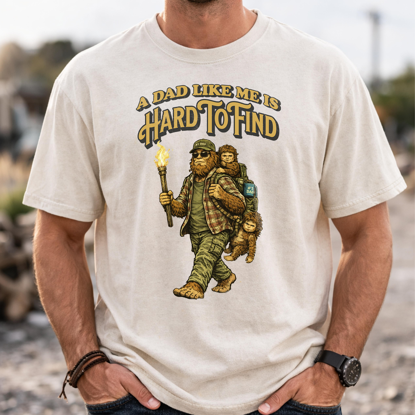 “A Dad Like Me Is Hard To Find” Funny Sasquatch Bigfoot T-Shirt for Dads, Retro Vintage Father’s Day Gift Idea – Organic Heavy T-Shirt